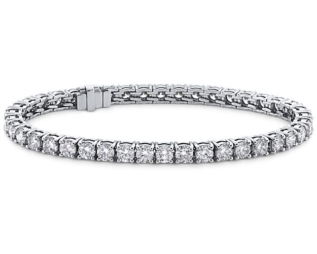 This extraordinary, one-of-a-kind bracelet features 45 Blue Nile Signature Ideal Cut diamonds, each hand-set in durable four-prong platinum settings.  The bracelet is accompanied by a GCAL Blue Nile Signature Certificate of Authenticity.