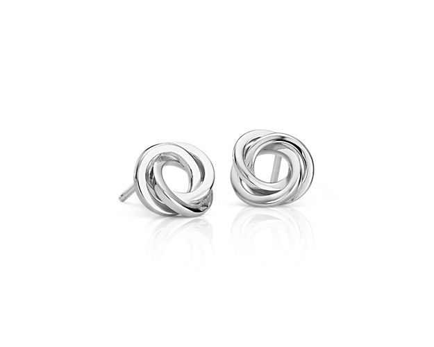 Always in style, these classic sterling silver stud earrings are great for everyday wear and are adorned with a flat love knot design.