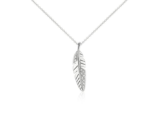 Accented with sparkling round brilliant cut pavé diamonds, this petite feather pendant in 14k white gold is delicately suspended on a matching cable chain.  For added versatility, the chain can be fastened at either 16" or 18", making it ideal for layering.