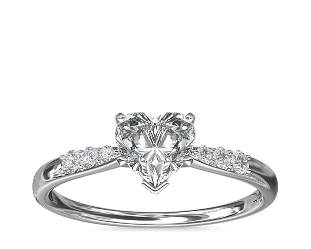 Complement your center diamond perfectly with this 14k white gold engagement ring accented with pavé-set diamonds along the shank.