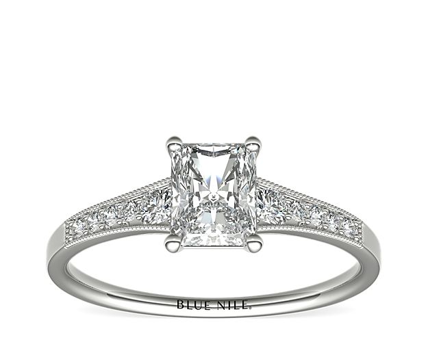Ideal for any center diamond of your choice, this 14k white gold engagement ring showcases a diamond accent along the shank and milgrain detailing.