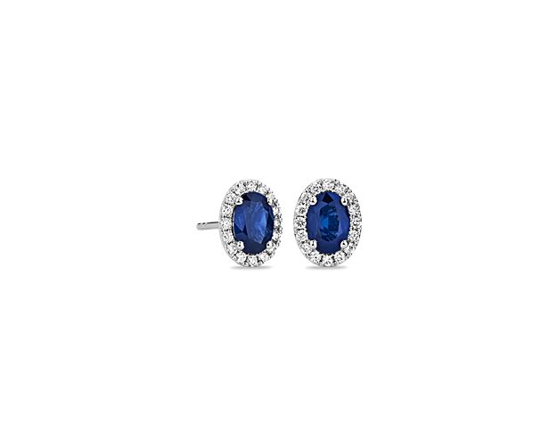 Sophistication and beauty grace these vibrant sapphire gemstone earrings, highlighted by a halo of micropavé diamonds framed in 14k white gold.