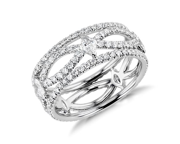 This light-catching eternity ring features a graceful marquise-shaped pattern of round pavé diamonds set in shining platinum. Brilliant marquise diamonds set at each tapered end echo the lattice design.
