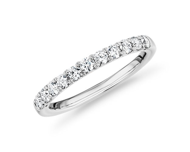 A unique and deep V-cut prong style allows the pavé-set round diamonds in this platinum anniversary band to really shine. An idea mate to your engagement ring or perfect in a right hand stack.