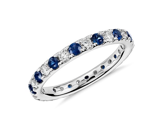 Stunning sapphires are punctuated by brilliant diamonds in this classic eternity band featuring alternating stones set in enduring platinum.  A symbol of loyalty and fidelity, sapphires are the perfect choice for a timeless wedding ring or anniversary band.
