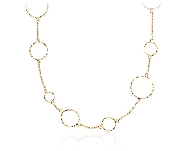 A wardrobe basic, this Italian crafted long circle station necklace is a must for your jewelry collection. Worn long or layered, it is sure to work with your style.