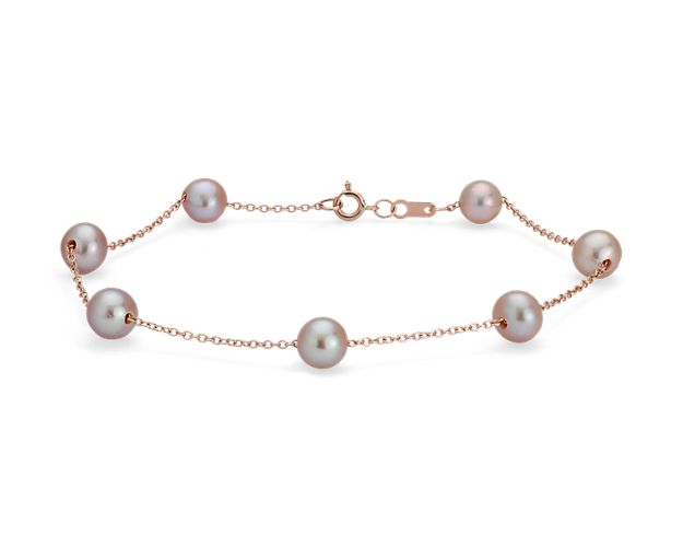 Break out of the classic pearl strand mold with this "Tin Cup" pearl bracelet, a style made famous by Rene Russo in the feature film of the same name. Six pink Freshwater cultured pearls are stationed along a classic 14k rose gold cable chain. This delicate twist is a great first pearl purchase or beautiful bridesmaid gift.