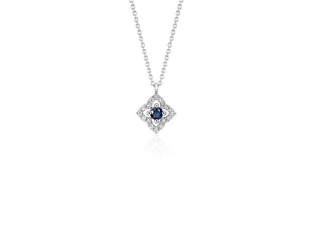 Delicate in design, this pendant features a beautiful sapphire gemstone surrounded by sparkling micropavé diamonds framed in 14k white gold.