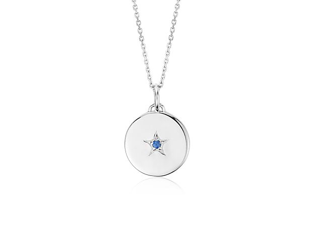 On one side of this meaningful charm, a bright blue sapphire graces the center of an engraved star, while the other side features the word "wish." This shiny sterling silver charm pendant makes a sweet and special gift for yourself or someone you love. Comes strung on a 18-inch sterling silver cable chain.