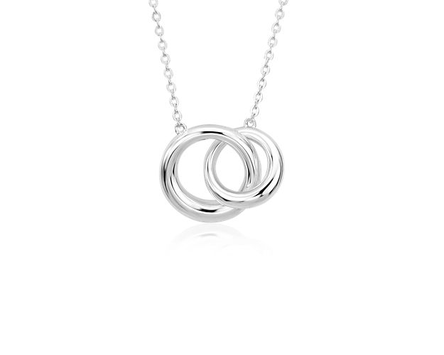 Shining with heartfelt symbolism, this infinity ring necklace works beautifully from day to night. Featuring interlocking rings crafted in polished sterling silver, the delicate cable chain can be worn at 16 or 18 inches.