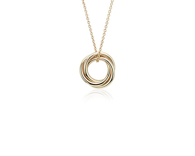 A delicate statement, this petite infinity rings pendant features three intertwined rings crafted of lightweight, polished tubing in 14k yellow gold for a look that's made to go wherever you go.
