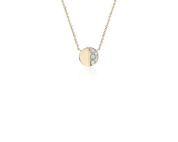 This on-trend, 14k yellow gold mini disc necklace is studded on one side with petite diamonds and smooth on the other.