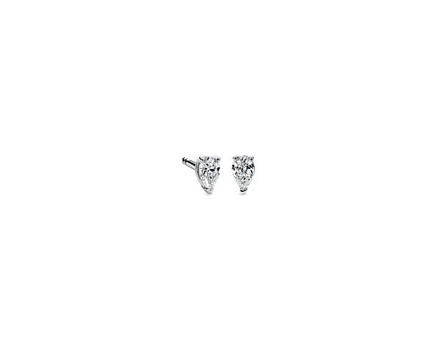 Classic and beautifully matched, these stud earrings feature near-colorless pear shape diamonds set in 14k white gold four-prong settings with double-notched friction posts. Each earring weighs roughly 1/8 carat, for a total diamond weight of 1/4 carat.