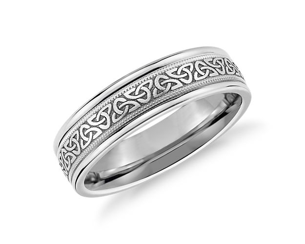 Rooted in traditional design, this 14k white gold ring adds a stylish twist as etched Celtic knots give it a look that transcends place and time.