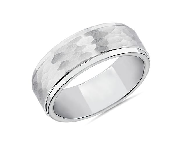 Constructed for your comfort, this handsome band is made of wear-resistant tungsten carbide and features lowered, polished edges, a smooth and comfortable interior, and a unique, satin-finished and hammered texture.