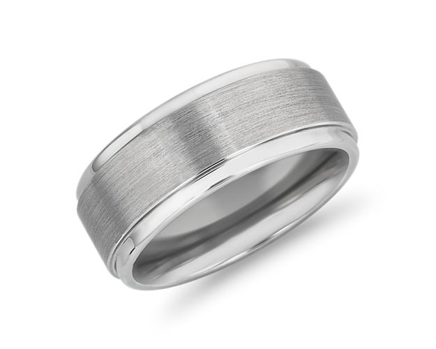 Comfortable and durable, tungsten carbide is scratch resistant and enduring. This band features a smooth interior for a comfortable fit, with step edge detailing, polished bright, and a central brushed finish for a study in handsome contrasts.