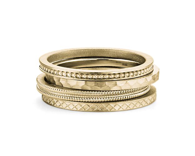 A fresh take on a classic ring stack, this hand-picked stack of masterfully crafted solid yellow gold bands are as chic as they are versatile. Wear the stack as shown or mix it up yourself for a special touch.