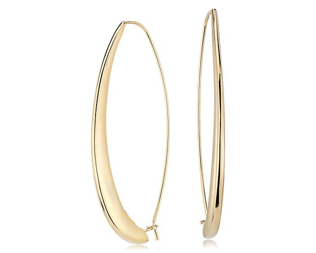 Evocative of modernist sculpture, these Italian-crafted threader earrings are forged in 14k yellow gold. Their substantial look and feel offers bold shine in a piece of jewelry that is sure to become a personal favorite for its iconic styling.
