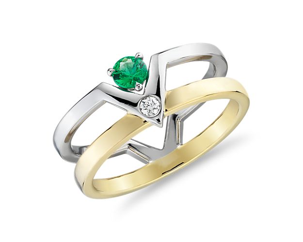 Two-tone geometric chevon ring with diamond and emerald stones