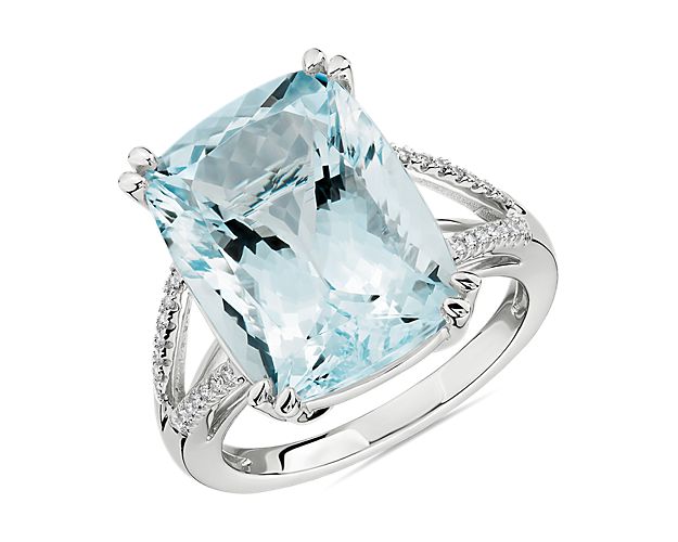 Elegant aquamarine makes a bold statement in this fashion-forward cocktail ring crafted in 14k white gold.