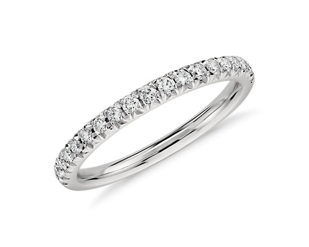 Accentuate the moment with this beautiful diamond ring, showcasing French pavé-set round diamonds.
