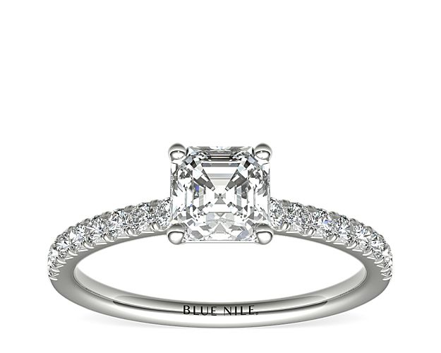 Eyes will be fixated on this immaculate platinum diamond engagement ring, showcasing French pavé-set diamonds that complement your choice of center diamond.