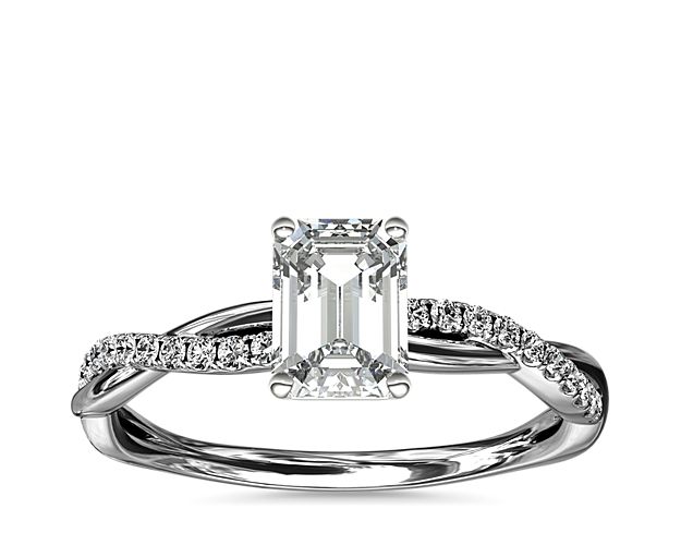 Classic with a twist, this 14k white gold engagement ring features a delicate twist of pavé-set diamonds that will complement the center diamond of your choice.