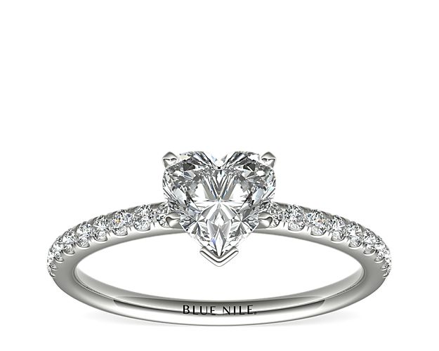 Classic elegance, this diamond engagement ring setting features pavé-set diamonds set in 14k white gold.
