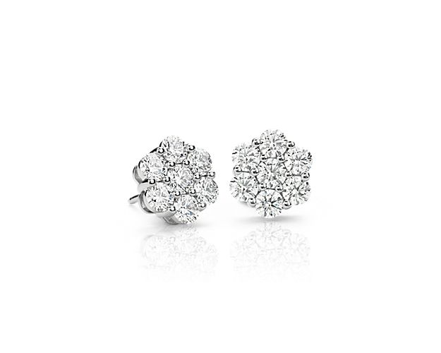 Classic elegance, these diamond cluster earrings showcase brilliant Blue Nile Signature Ideal cut round diamonds set in enduring Platinum, a simply graceful gift.