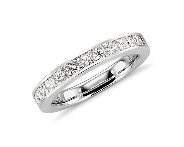 A platinum ring with channel set princess-cut diamonds is a beautiful take on a classic style. Ideal as a wedding ring or as an anniversary gift.