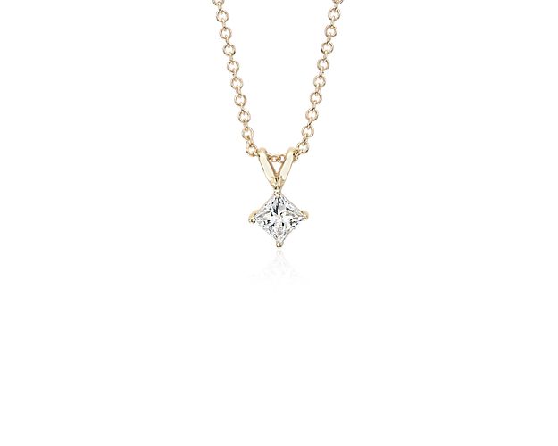 Classically elegant, this cable chain diamond necklace features a striking princess cut diamond set in 14k yellow gold.