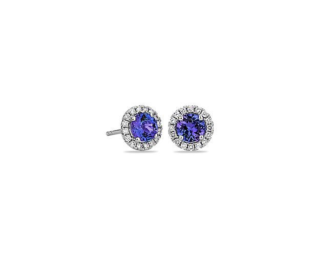 For someone who wants to add a bit of color to a classic style, these vibrant tanzanite and diamond halo earrings are an ideal choice. Crafted in bright 14k white gold, these gemstone stud earrings feature round tanzanite gems surrounded by sparkling halos of micropavé diamonds. Their petite size makes them a great everyday jewelry option.