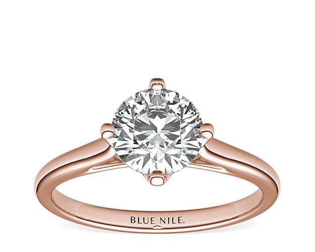 Show your love with this 14k rose gold engagement ring, featuring a east west prong set solitaire diamond.
