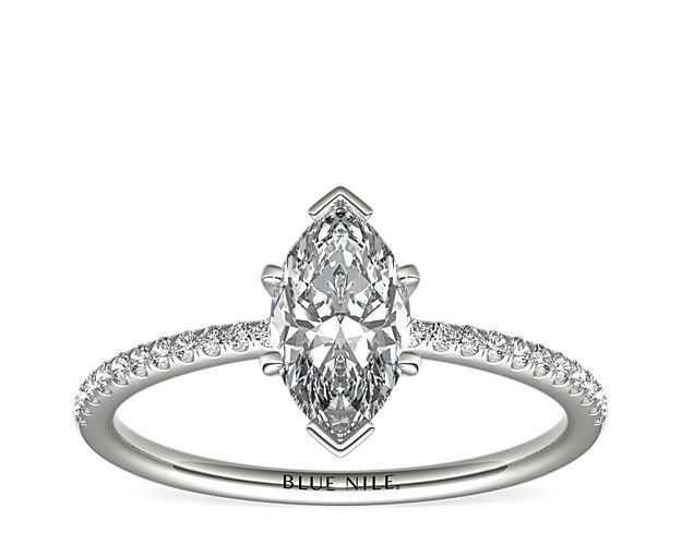 Delicate and beautiful, this diamond engagement ring in 14k white gold features a half circle of sparkling petite micropavé diamonds to complement your center diamond.