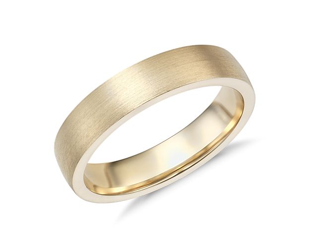 Modern in appeal and premium in weight, this 14k yellow gold wedding band features a contemporary low dome silhouette and rounded interior for comfortable everyday wear.