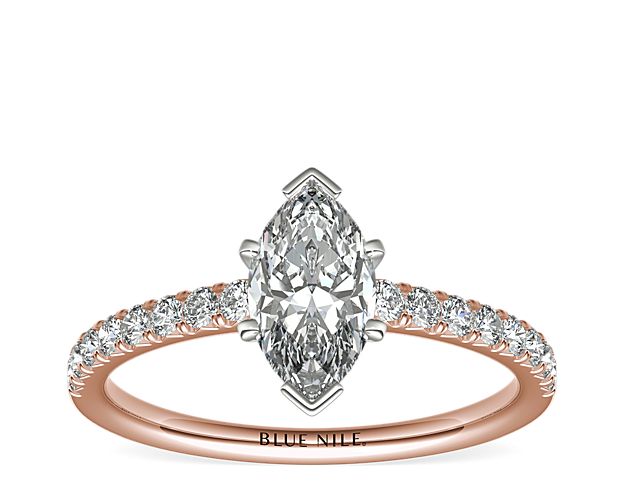 With the perfect hint of pink, this engagement ring showcases French pavé-set diamonds set in 14k rose gold that complement your choice of center diamond.