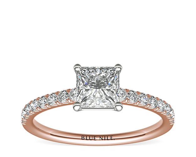 With the perfect hint of pink, this engagement ring showcases French pavé-set diamonds set in 14k rose gold that complement your choice of center diamond.