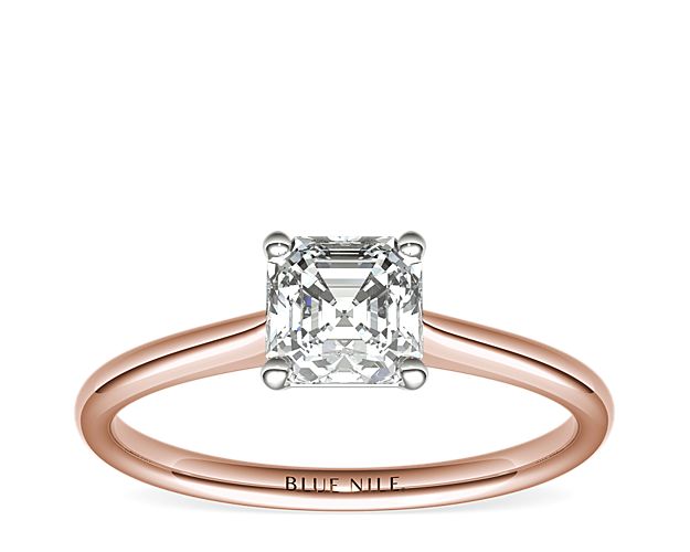 Elegant in its simplicity, this petite solitaire crafted in 14k rose gold is a beautifully classic frame for your choice of center diamond.
