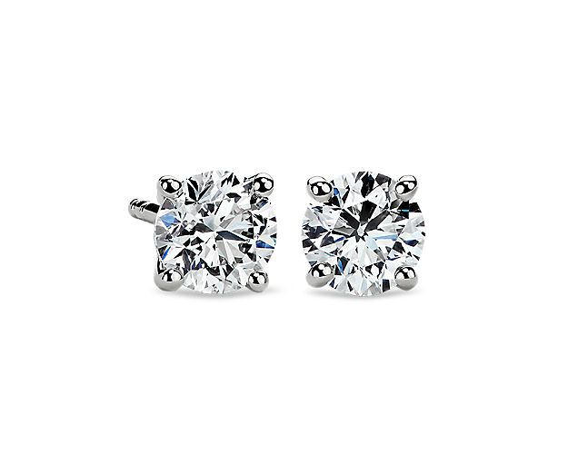 These Classic Four-Prong Earrings in Platinum are set with your choice of perfectly matched diamonds.