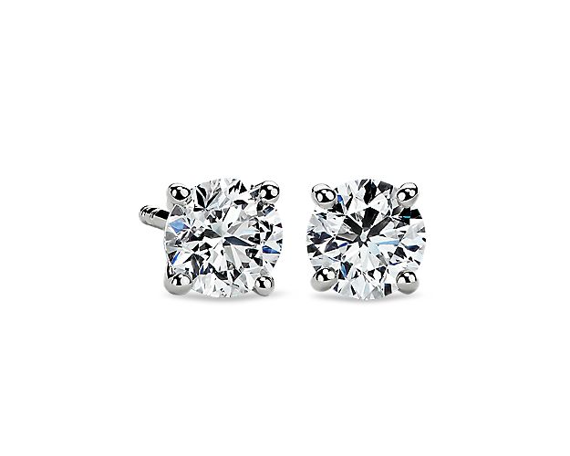 These Classic Four-Prong Earrings in 18k White Gold are set with your choice of perfectly matched diamonds.