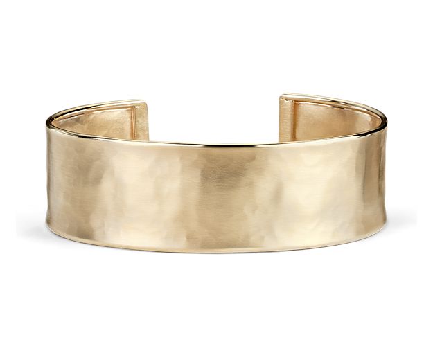 This simple 14k yellow gold cuff bracelet makes a striking impact. Italian-crafted with a subtle hammered texture and soft satin finish, this glowing cuff bracelet adds a modern, organic finish day or night.