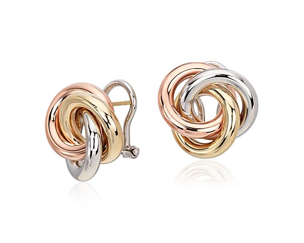 This beautiful classic style is forged of 14k white, rose and yellow gold. Secured by an omega closure, these Italian crafted love knot earrings are sure to impress.