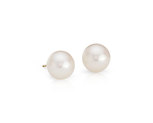 Versatile pearl earrings perfect for everyday wear, featuring freshwater cultured pearls mounted on 14k yellow gold posts with push backs for pierced ears.