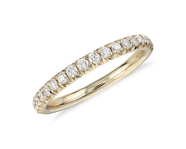 Accentuate the moment with this beautiful diamond ring, showcasing French pavé-set round diamonds set in 14k yellow gold.