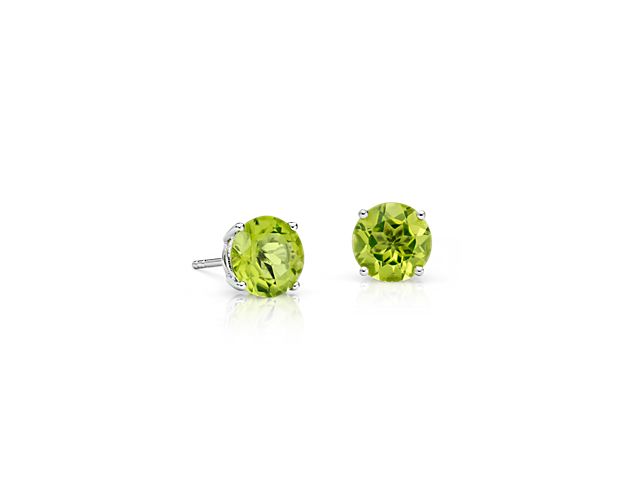 Delightfully colorful, these hand-selected gemstone earrings feature vibrant green peridot complemented by 14k white gold four-prong settings.