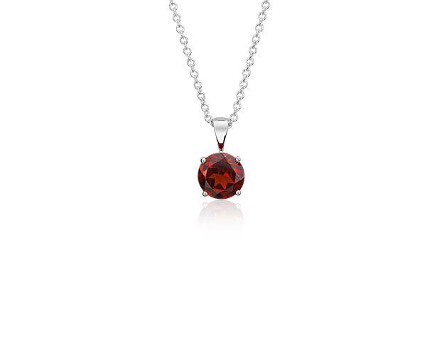 Vibrant and colorful, this gemstone pendant features a deep burgundy garnet set in a 14k white gold four-prong setting suspended from a dainty 18-inch cable chain. A classic piece of everyday luxury and the birthstone for January.