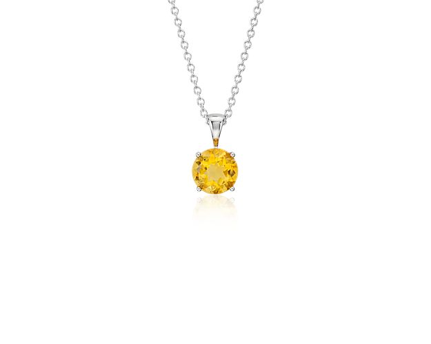 Vibrant and colorful, this gemstone pendant features a sunny orange-yellow citrine set in a 14k white gold four-prong setting suspended from a dainty 18-inch cable chain. A classic piece of everyday luxury and the birthstone for November.
