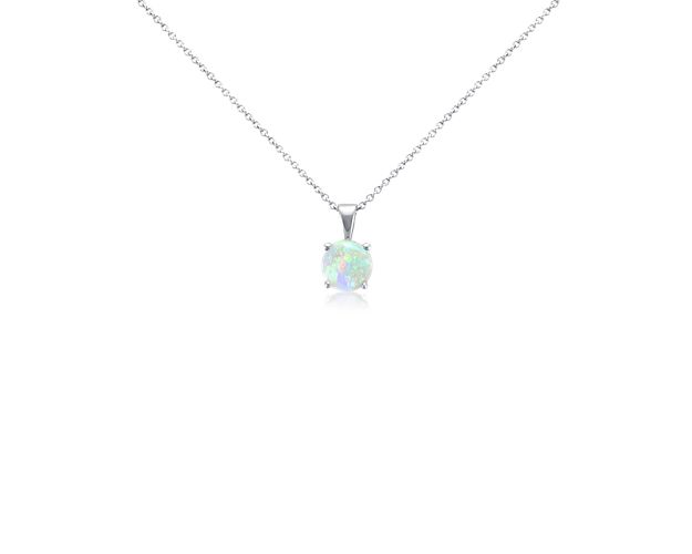 Vibrant and colorful, this gemstone pendant features a fiery opal set in a 14k white gold four-prong setting suspended from a dainty 18-inch cable chain. A classic piece of everyday luxury and the birthstone for October.