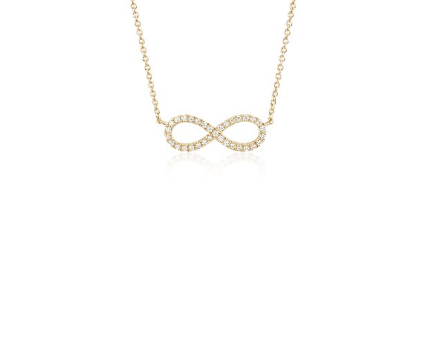 Brilliant and meaningful, this small infinity diamond pendant features round diamonds pavé-set in 14k yellow gold with a matching cable chain necklace. This necklace can be worn at 16 or 18 inches in length.