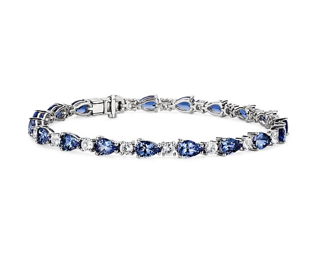 Captivating in color, this bracelet features vibrant tanzanite gemstones accented with sparkling white sapphires framed in 14k white gold.